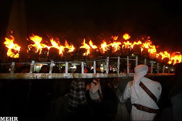 عکس های خبری جذاب و دیدنی های امروز تاسوعا مراسم نمادین مشعل گردانی در قم www.TAFRIHI.com