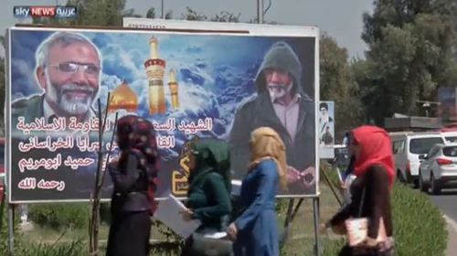 نصب تصویر شهید حمید تقوی فر از فرماندهان شهید سپاه در جنگ داعش با عراق در خیابان های بغداد توسط گردان های خراسانی.
