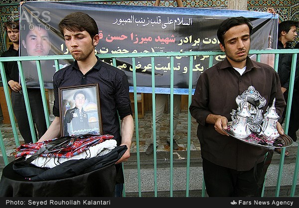 تشییع پیکر شهید مدافع حرم میرزا حسین قربانی در قم (عکس)