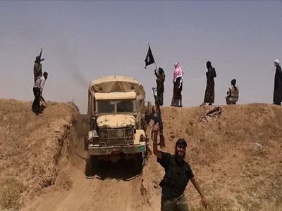 مرز سوریه و عراق در کنترل داعش/ درگیری داعش با نظامیان کردستان عراق/ سقوط تکریت در 150 کیلومتری بغداد/ استاندار صلاح الدین ربوده شد / درخواست نوری مالکی از آمریکا برای دخالت نظامی