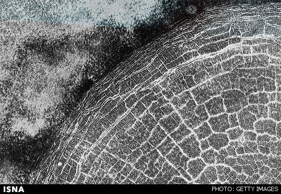 ثبت تصویر دهانهای پر از شکاف در مریخ ثبت تصویر دهانهای پر از شکاف در مریخ