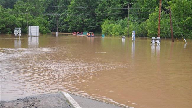 آمریکا در آتش و سیل؛ 26 کشته (+عکس و فیلم) آمریکا در آتش و سیل؛ 26 کشته (+عکس و فیلم)