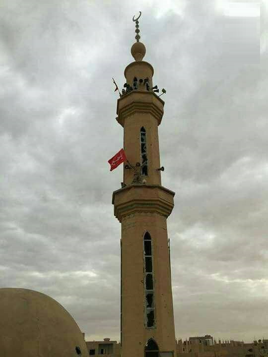 برافراشتن پرچم یا حسین درآخرین پایگاه داعش (عکس)