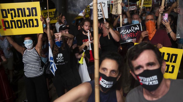 تظاهرات شهروندان اسرائیل علیه نتانیاهو(+عکس)/ نتانیاهو در دادگاه