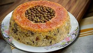 طرز تهیه متفاوت‌ترین پلو مخلوطی که خوردید؟! ترکیب نخود فرنگی و مرغ