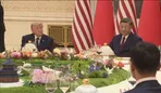 ترامپ کوسن روی صندلی را برداشت و پایین تر از شی نشست!