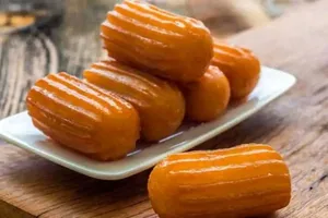 طرز تهیه بامیه عربی بزرگ و کم‌شیرین به روش بازاری