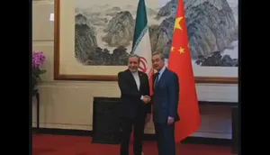 تصاویری از دیدار عباس عراقچی با وانگ یی در پکن